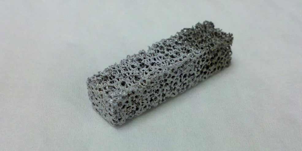 Electrodeposited indium on molybdendum foam.